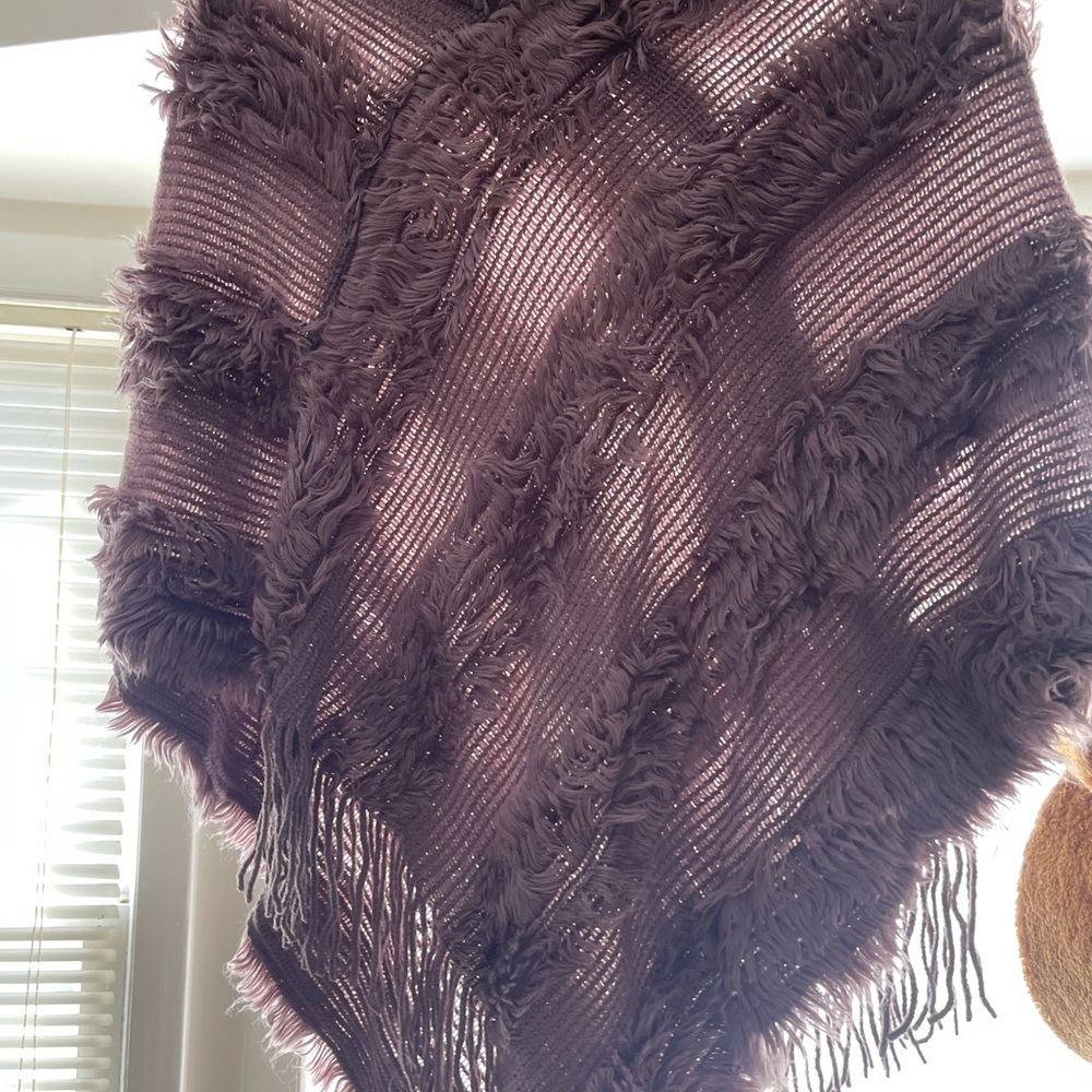 Pancho mauve color. Feels nice and soft and great for cold spring days.